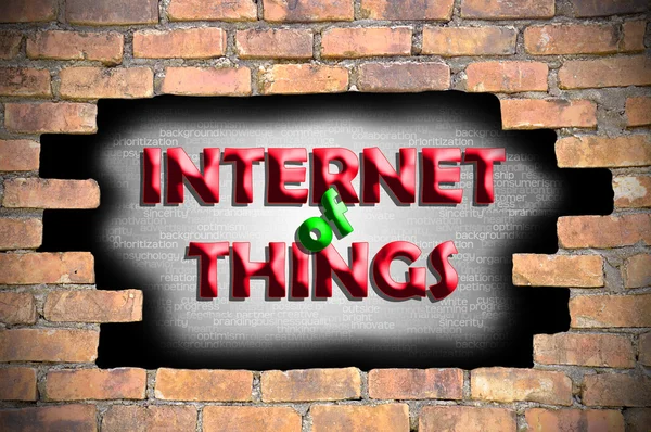 Интернет вещей в дыре кирпичной стены — стоковое фото
