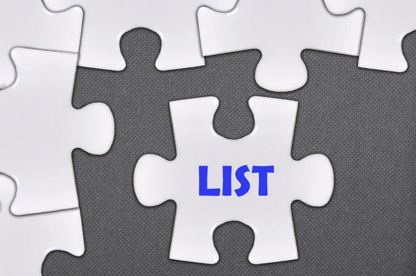 Jigsaw puzzle written word list — Stock Photo, Image