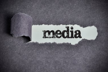 medya kelime yırtık siyah şeker kağıt'ın altında 