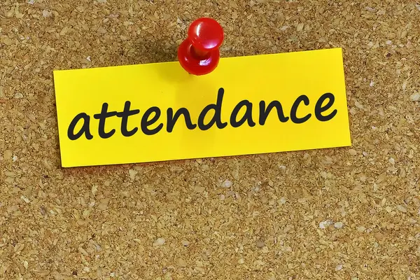 Attendance  word on notes paper with cork background — Stock Photo, Image