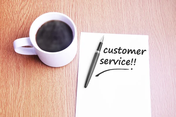 Café, bolígrafo y notas escribir servicio al cliente —  Fotos de Stock