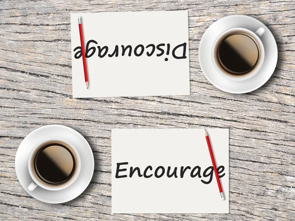 Business Concept : Comparison between discourage and encourage — Stock Photo, Image