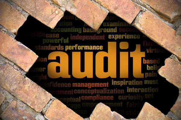 Hole at the brick wall with audit word cloud inside — Stock Photo, Image