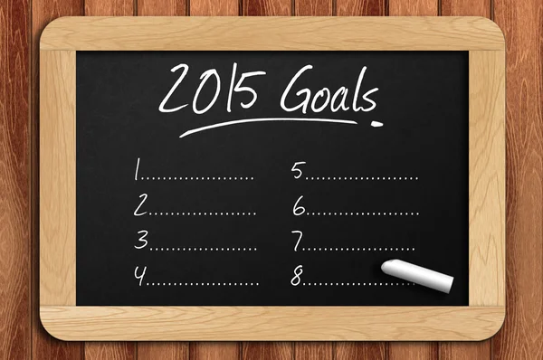 A fából készült asztal 2015 céljaimat listát írt a Chalkboard — Stock Fotó