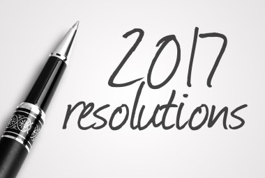 pen writes 2017 resolutions on paper clipart
