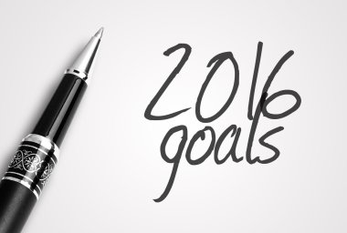 pen writes 2016 goals on paper clipart