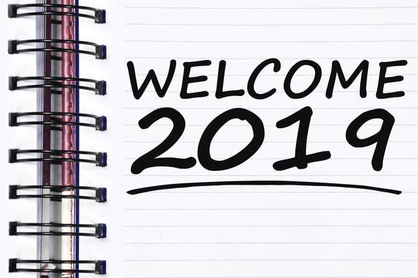 Welcome 2019 words on spring note book — Stock Photo, Image