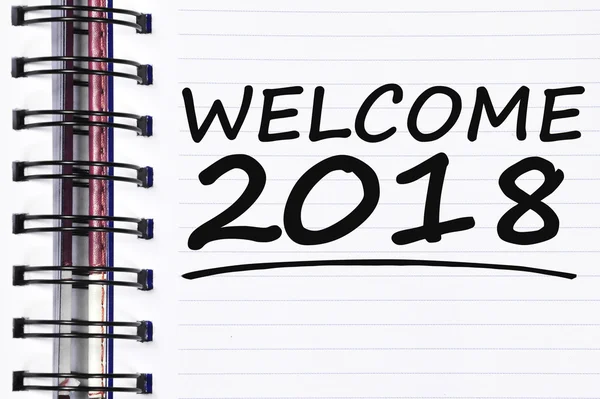 Welcome 2018 words on spring note book — Stock Photo, Image