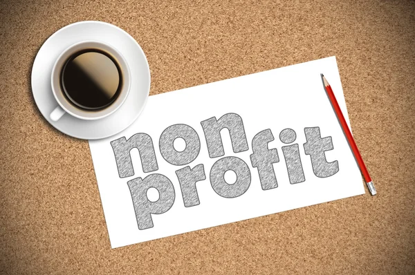 Koffie en potlood schets non-profit op papier — Stockfoto