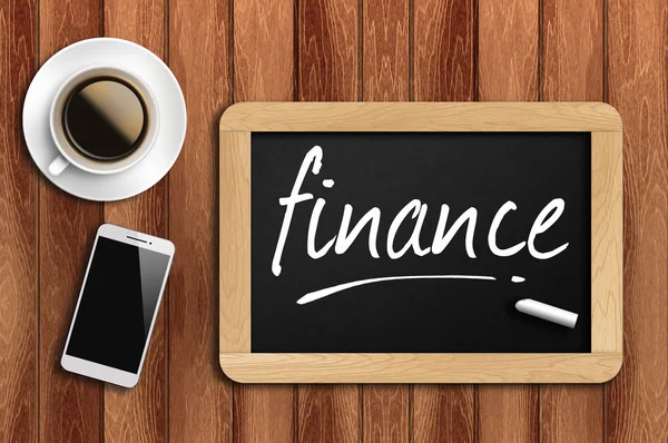 Coffee, phone  and chalkboard with  word finance — Stock Photo, Image