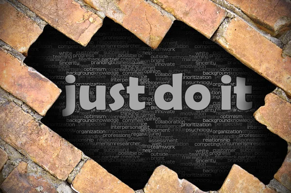 Hole in the brick wall with word just do it — Stock Photo, Image