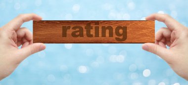 Bir ahşap holding eller ile kelime beğenilme basık