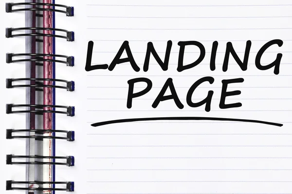 Palabras de landing page en el cuaderno de primavera —  Fotos de Stock