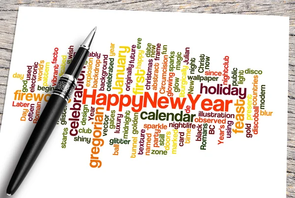 Nära håll pennan och glad Nyåren Word Cloud — Stockfoto