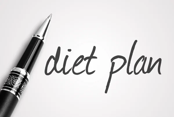 Pen writes diet plan on white blank paper — Stock Photo, Image