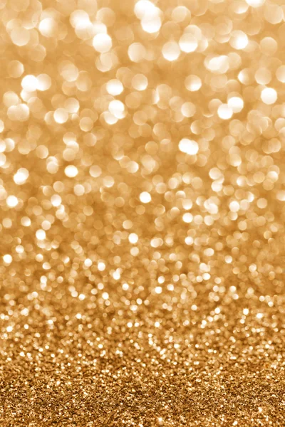 Gouden schittering. Glitter-achtergrond. — Stockfoto