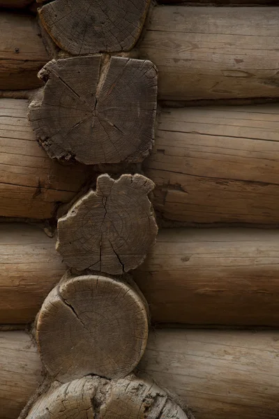 Muur van een houten huis — Stockfoto
