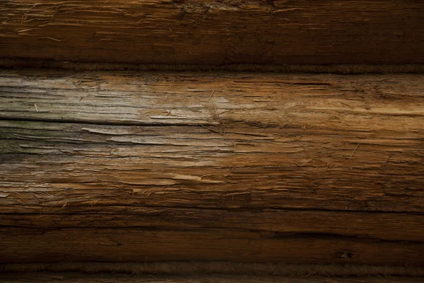 Muur van een houten huis — Stockfoto