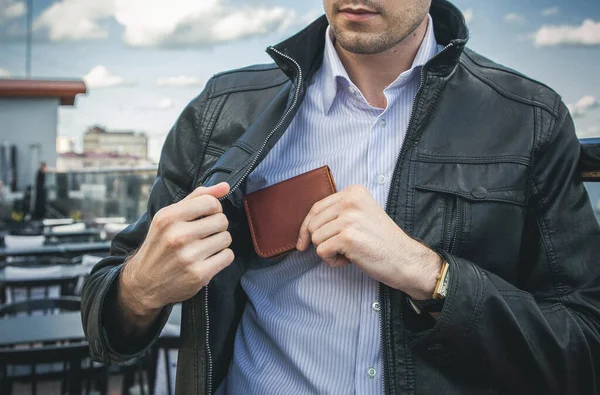 Mens hand wallet in the pocket