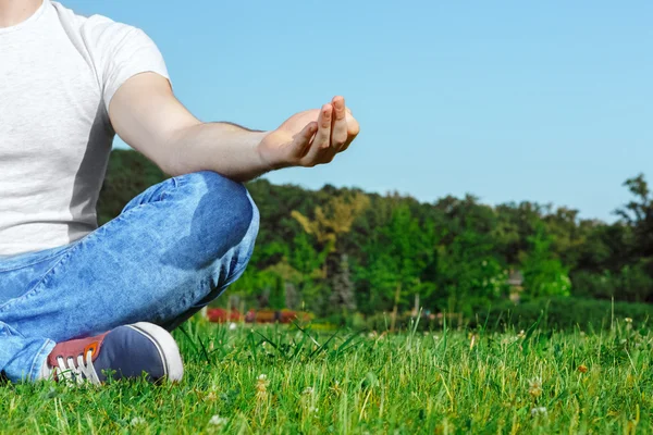 Young man resting in the park — Stock Photo, Image