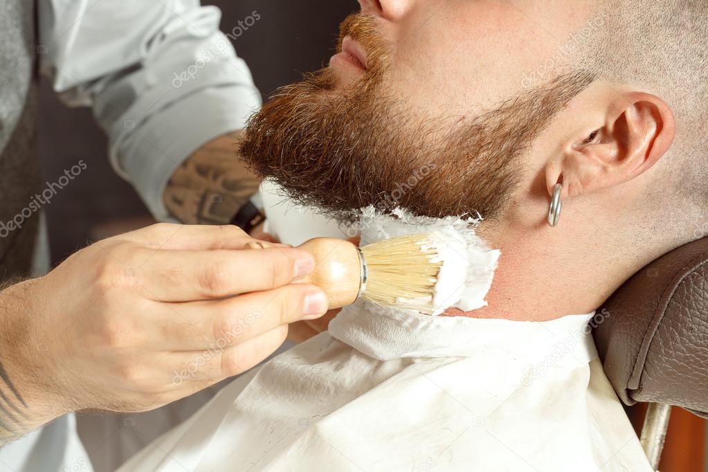 Neck soaping and shaving in barber shop