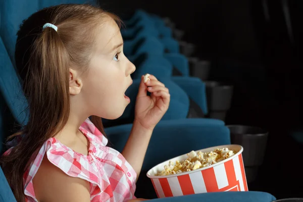 Adorable little girl with popcorn — Stock Photo, Image