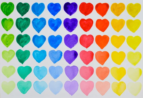 A love of painting. Rainbow watercolour hearts in rows. — Stock Photo, Image