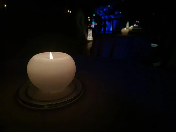 View on the candles in darkness. Low light image