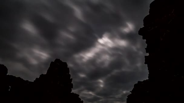 Time lapse of dark clouds moving over medieval ruin castle Hammershus — Stock Video