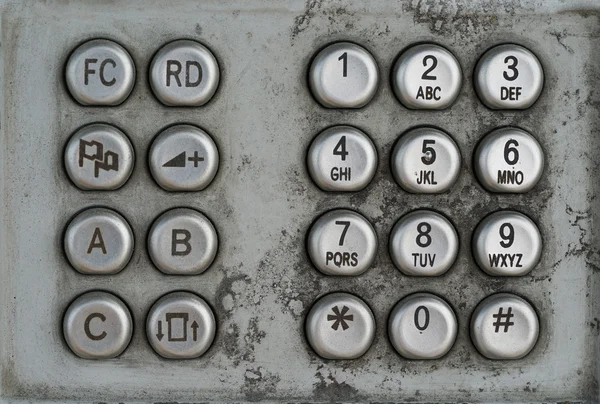Dirty keypad on public telephone — Stock Photo, Image
