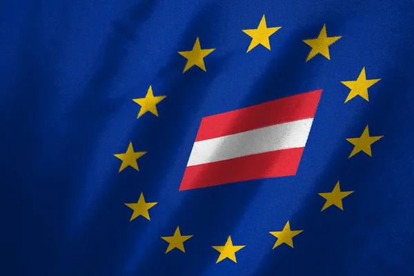 Austria flag in EU flag on fabric — Stock Photo, Image