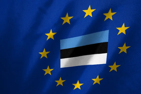 Estonia flag in EU flag on fabric — Stock Photo, Image