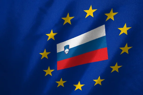 Slovenia flag in EU flag on fabric — Stock Photo, Image
