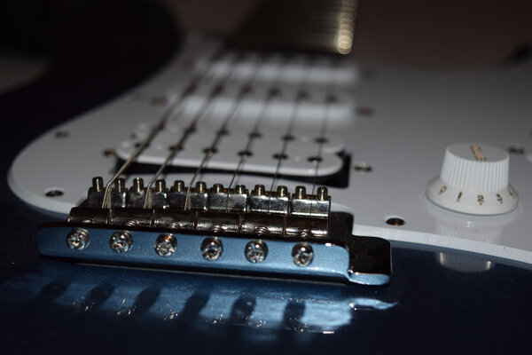 Electric six string guitar closeup, detail of electric guitar