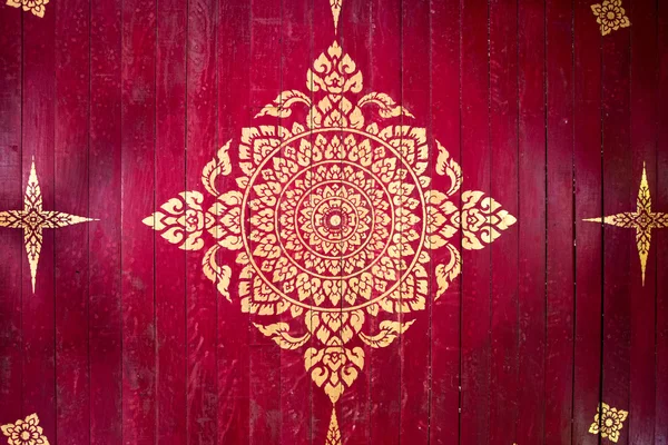 Kırmızı bir arka plan altın buddha