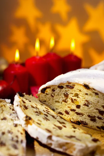 Christstollen and red candles — Stock Photo, Image