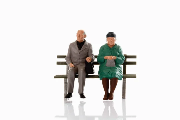 Figurinas do pensionista de velhice — Fotografia de Stock