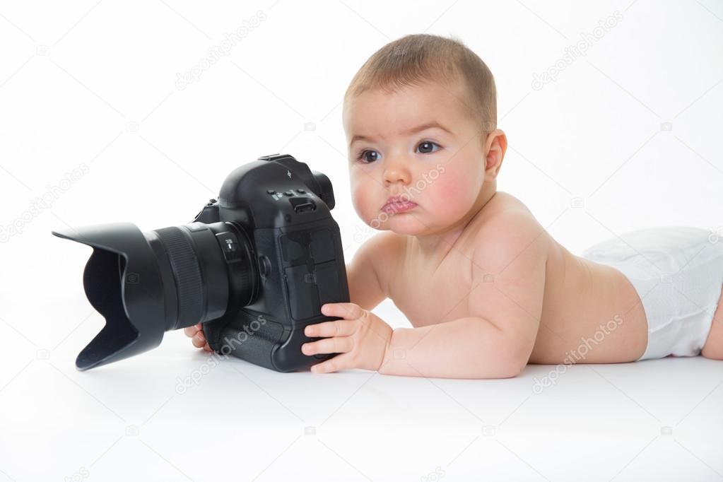 Female baby with big camera — Stock 
