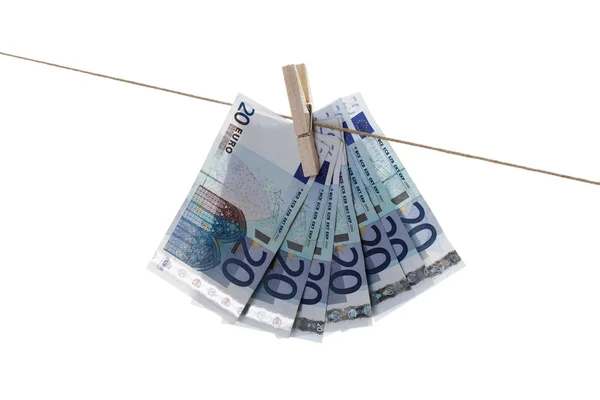 Billets de banque de 20 euros accrochés à la corde à linge — Photo