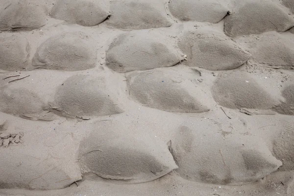 Bolsos de arena en la playa — Foto de Stock