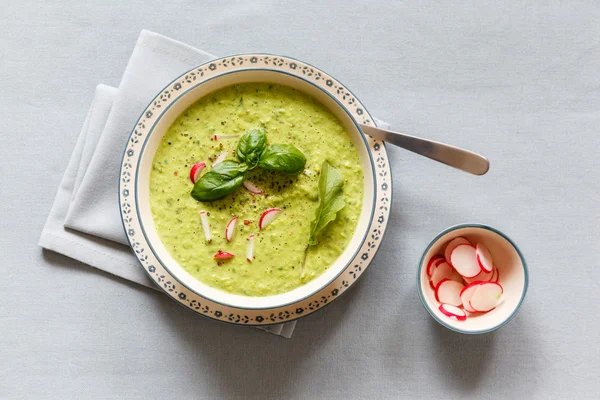 Pea soup with red radish — Stock Image Pea soup with red radish Royalty Free Stock Images