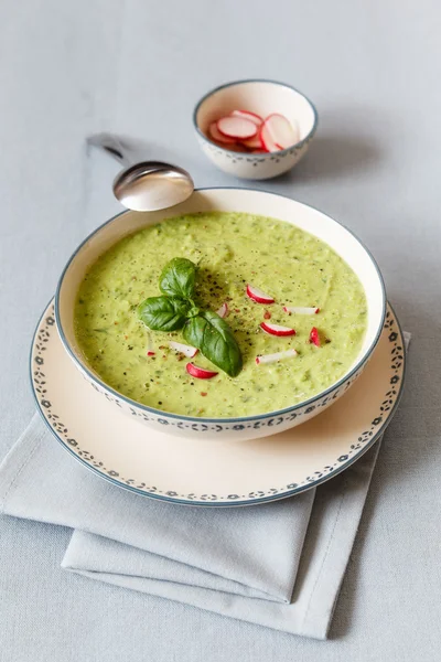 Pea soup with red radish — Stock Image Pea soup with red radish Royalty Free Stock Images