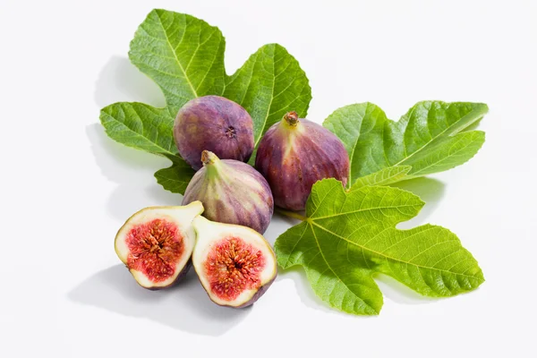 Fresh figs with leaves on white background — Stock Photo, Image