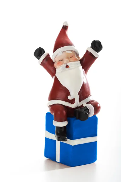 Vader Kerstmis liggen op heden geïsoleerd op wit — Stockfoto