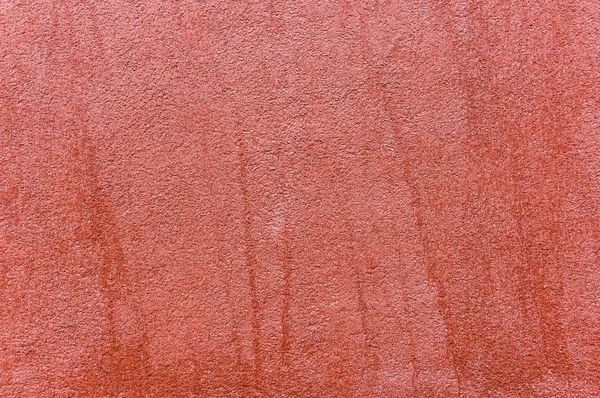 Zbliżenie zewnątrz ściany z czerwony kolorowy tynk ozdobny, tekstury — Zdjęcie stockowe