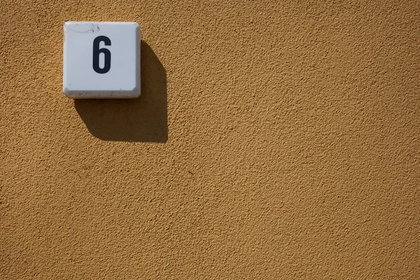 House number, six, outside wall, copy space — Stock Photo, Image