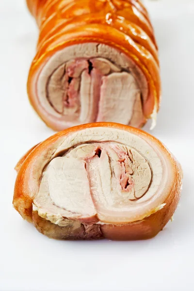 Slices of roasted rolled roast, suckling pig — Stock Photo, Image