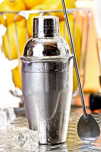 Shaker and spoon, ice cube — Stock Photo, Image