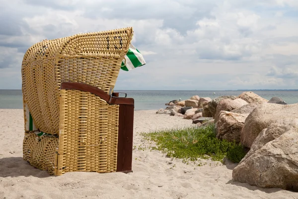 Deutschland, schleswig-holstein, baltic sea, beach chair at beach — Stockfoto