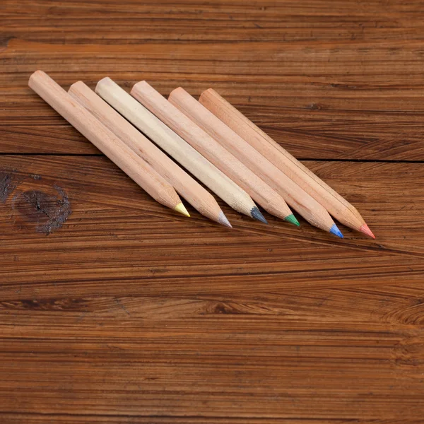 Coloured pencils on wood — Stock Photo, Image